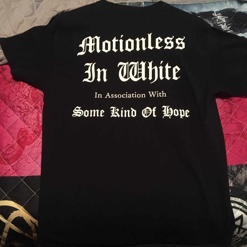 Motionless in white shirt small / medium